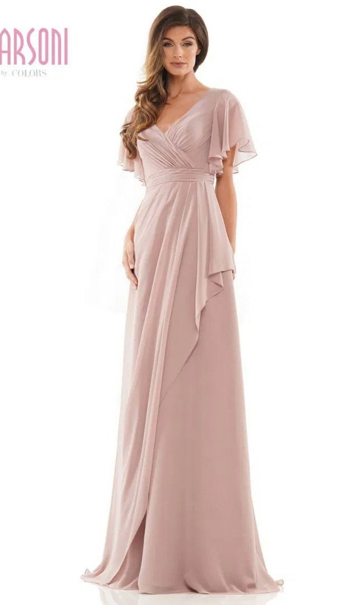 A woman stands against a plain white background wearing the Marsoni M320 long formal dress in mauve, featuring chiffon fabric, flutter sleeves, a V-neckline, an A-line floor-length skirt, and layered draping detail.